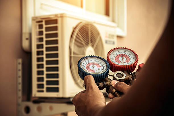Professional Air Conditioning Service technician working in Santa Anna, TX